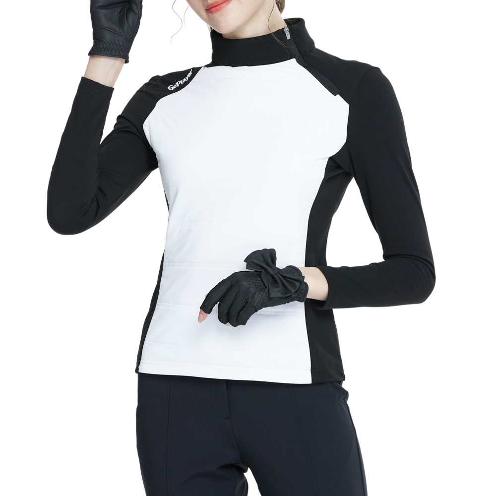 斜めのジッパーが付いた白いタートルネックのスウェットシャツ